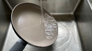 Salter Ceramic Non-Stick Frying Pan being washed up