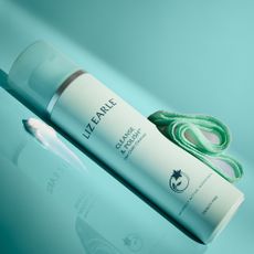 Liz Earle cleanse and polish on blue background