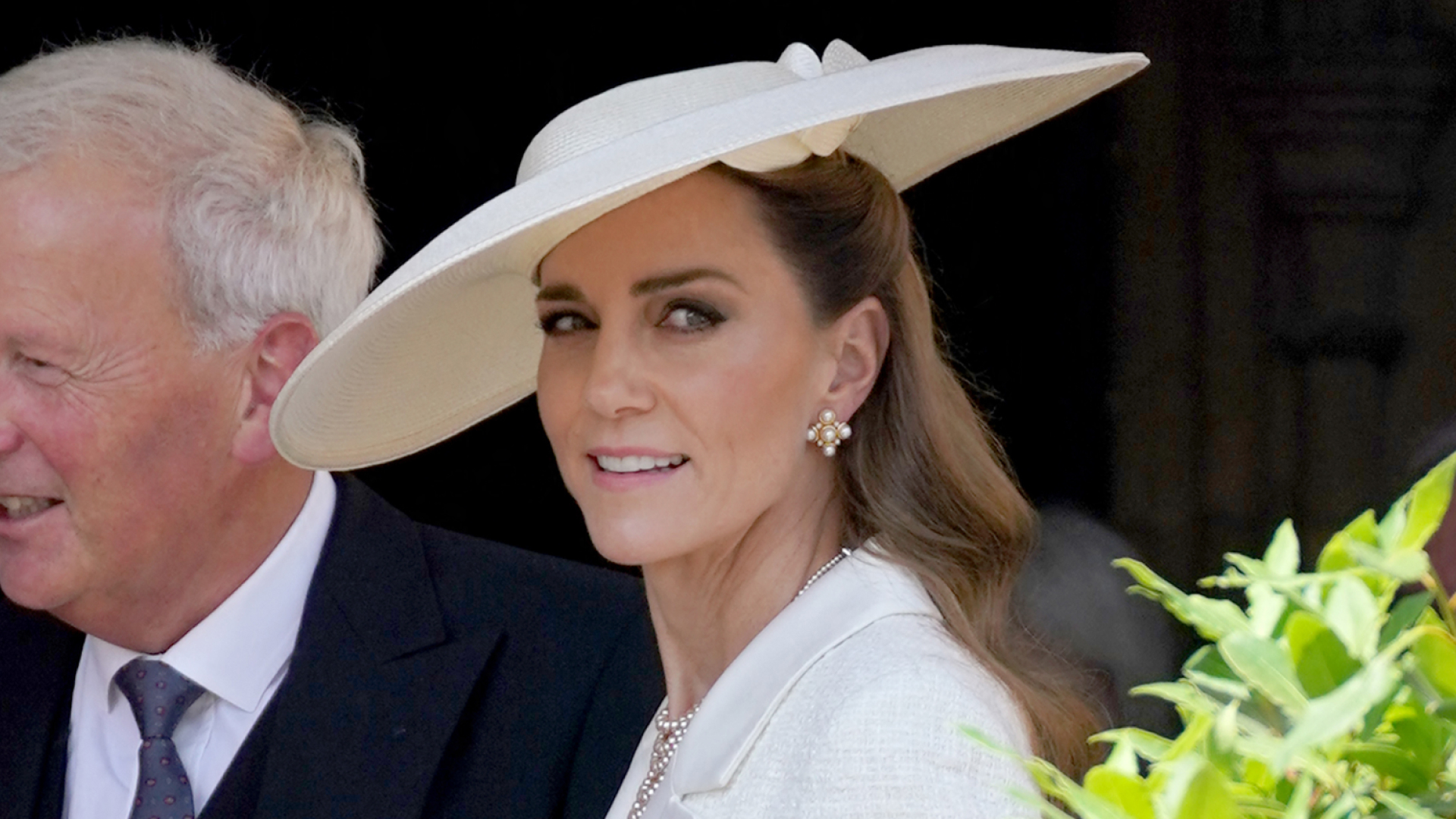 Kate Middleton wears a white Self-Portrait blazer dress with a matching hat to attend Order of the Garter in 2025