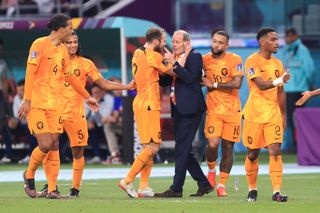 Daley Blind of Netherlands celebrates their second goal with his dad and Netherlands assistant coach Danny Blind during the FIFA World Cup Qatar 2022 Round of 16 match between Netherlands and USA at Khalifa International Stadium on December 3, 2022 in Doha, Qatar. (Photo by Simon Stacpoole/Offside/Offside via Getty Images)