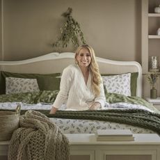 Stacey Solomon in her bedroom decorated with the homewares from her George Home collection