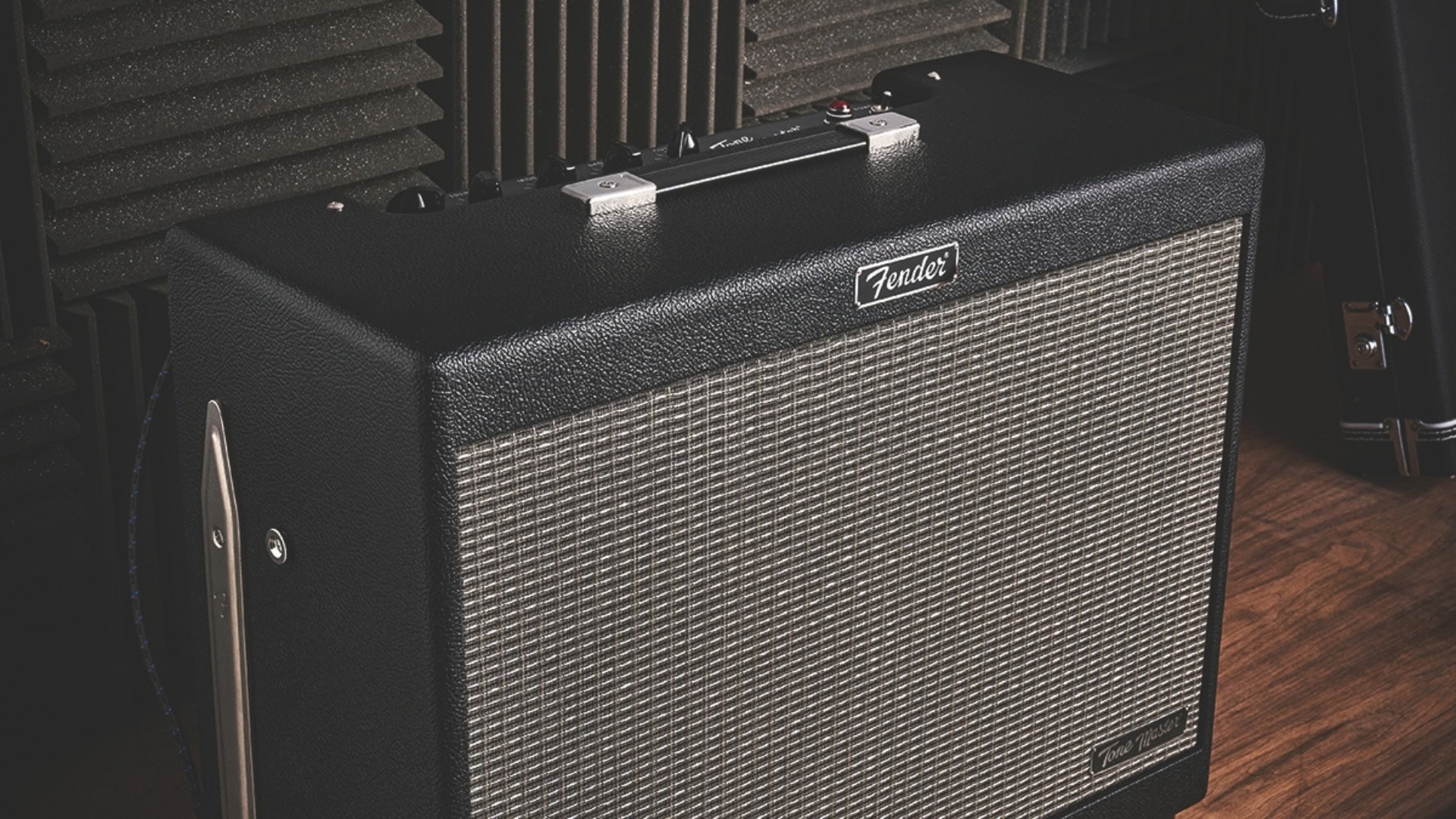 A Fender Tone Master FR-12 on a wooden floor in a studio