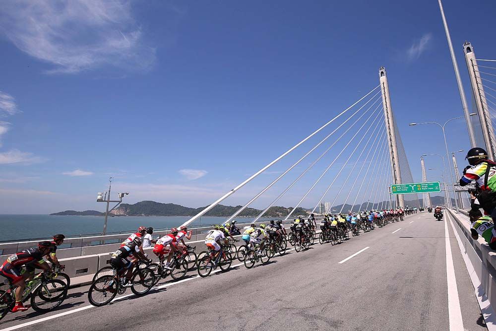 The riders cross to the island