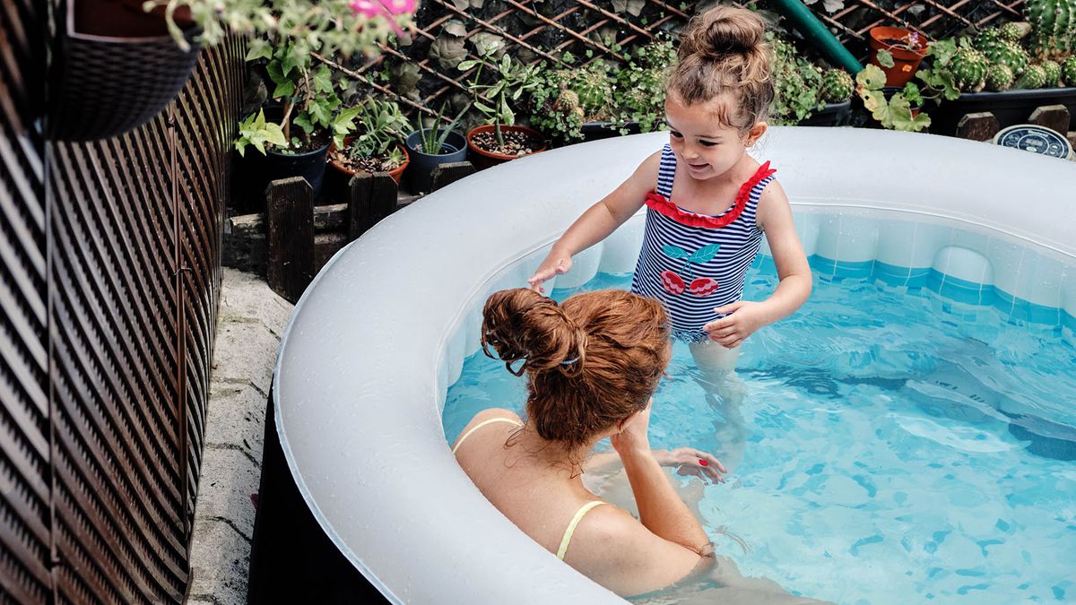 Mother and daughter in a hot tub