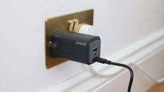Anker Prime 100W charger in a wall socket