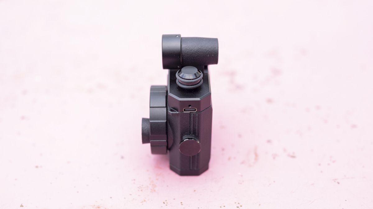 Alfie Tych camera on pink surface