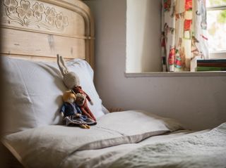 child's room in a renovated rustic cottage