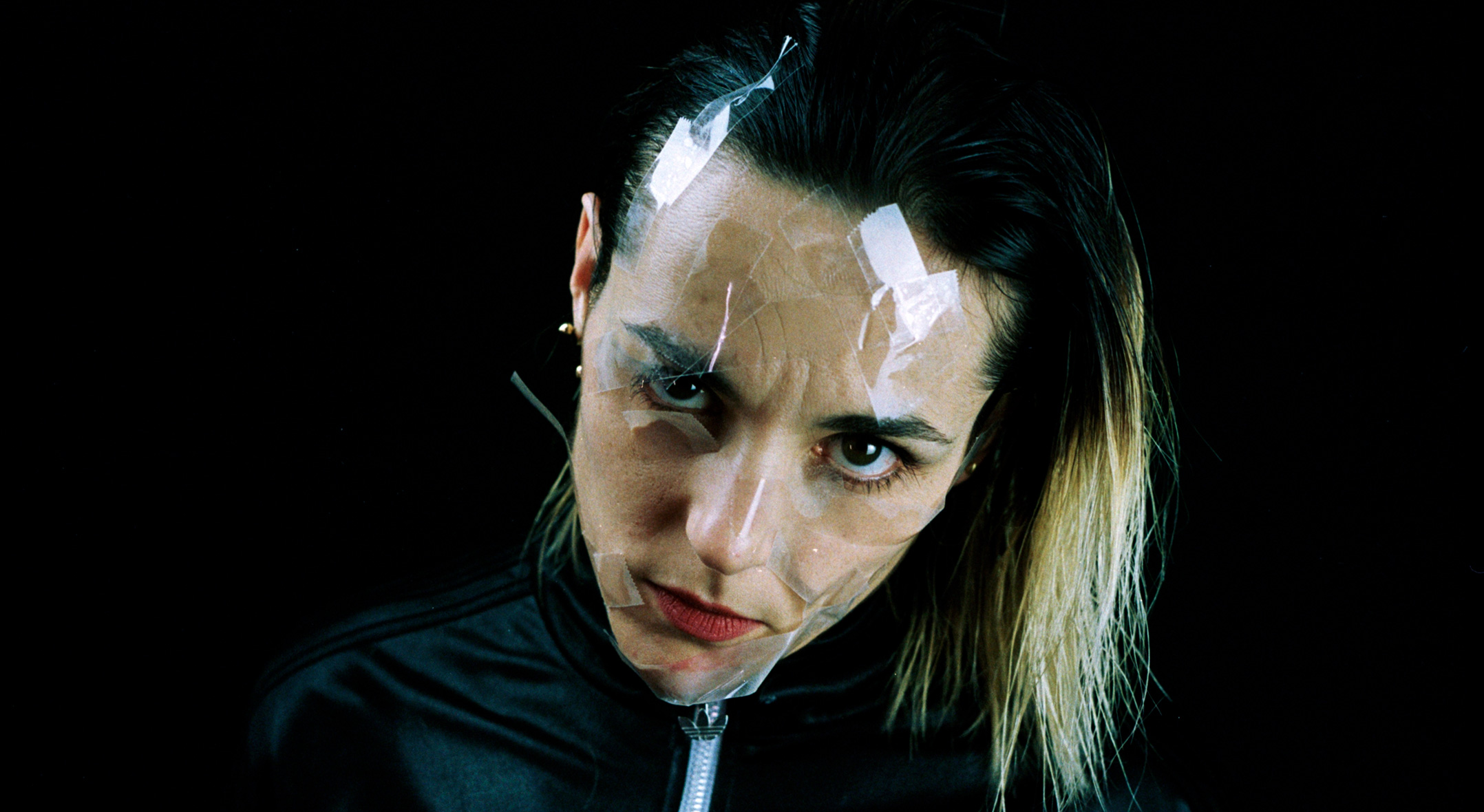 Jehnny Beth with plastic across her face 2025