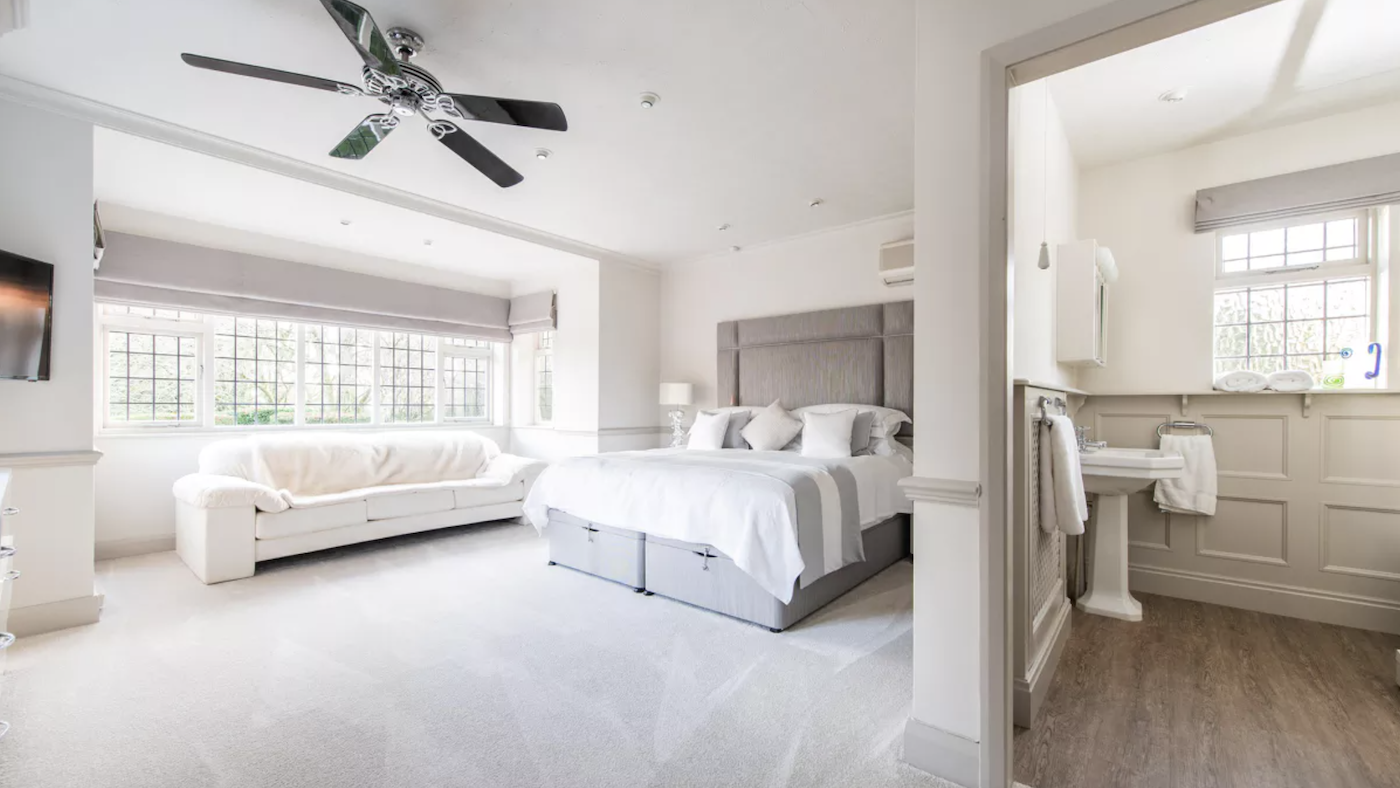 En suite bedroom with fan