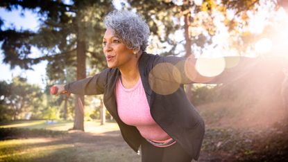 Older woman exercising in nature