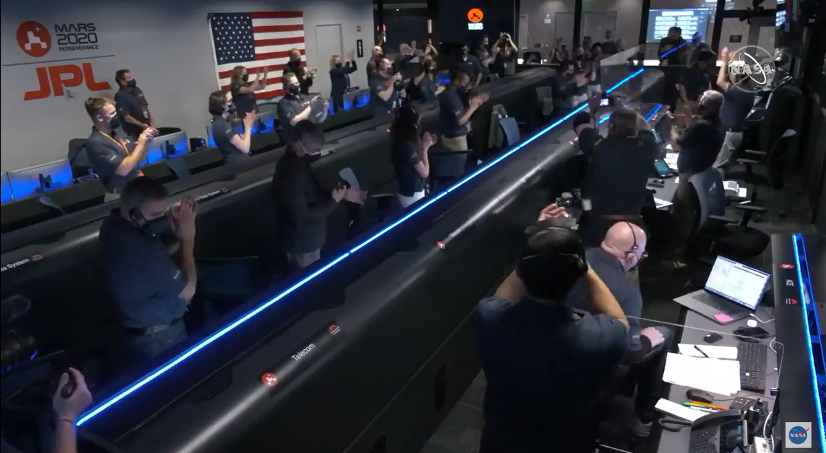 The Perseverance mission control room celebrates the rover's touchdown on Feb. 18, 2021.