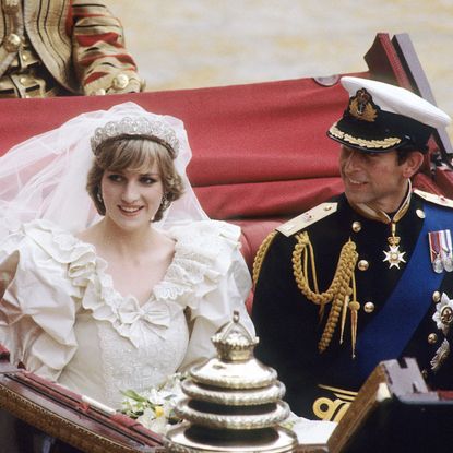 Princess Diana sitting in a carriage with Prince Charles