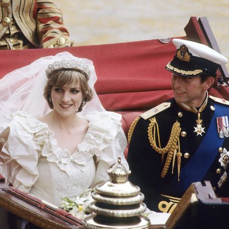 Princess Diana sitting in a carriage with Prince Charles