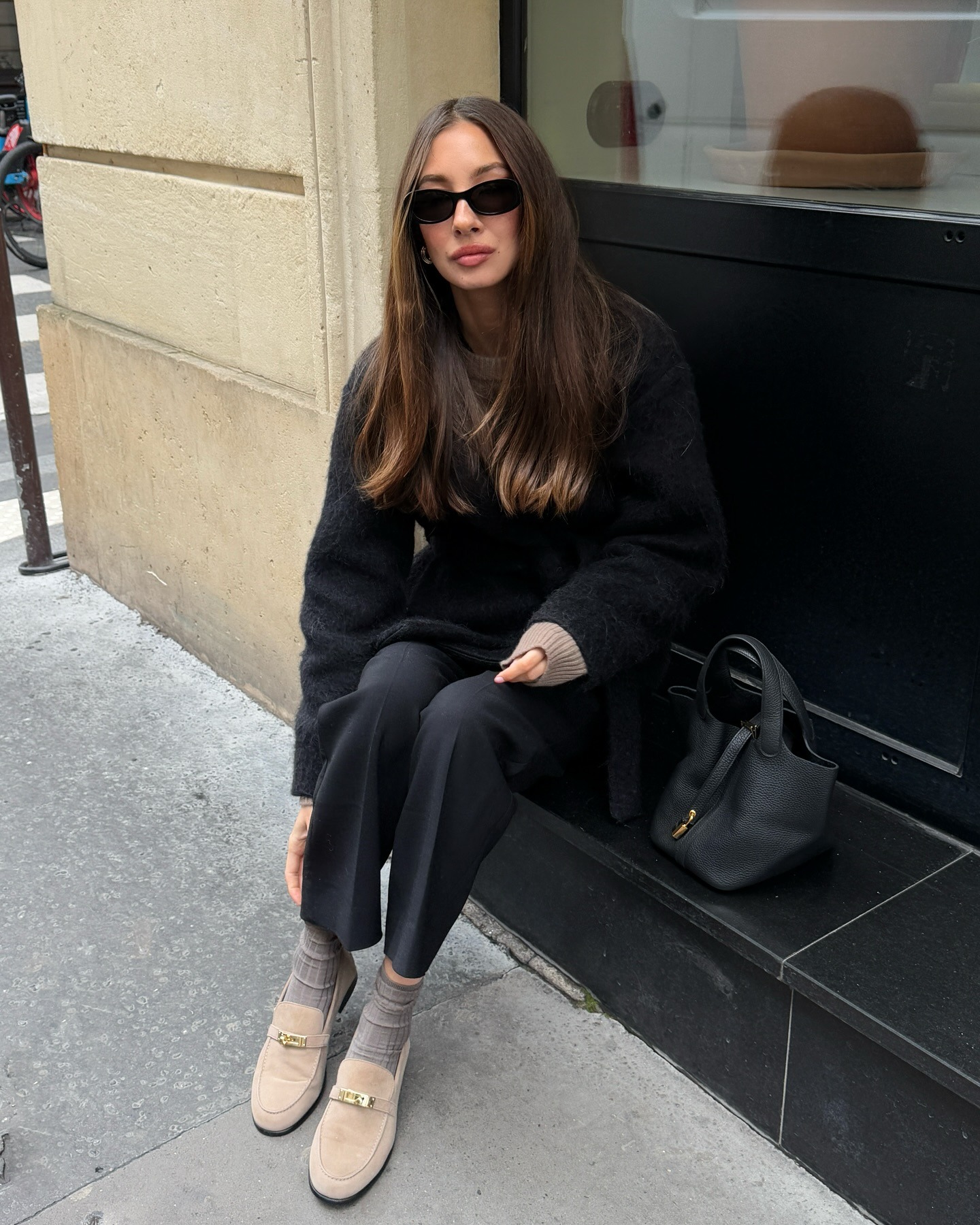 Influencer wearing suede loafers