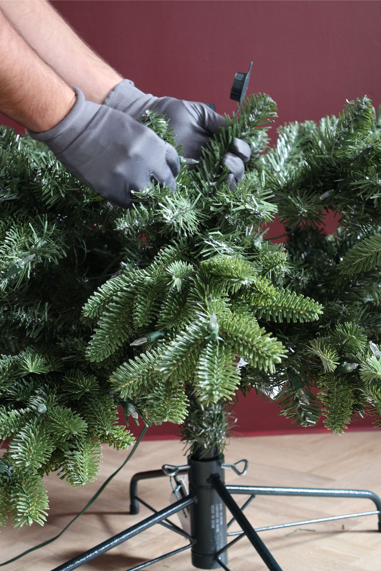 fluffing christmas tree branches