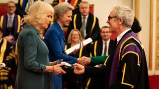 Queen Camilla presents the Queen's Anniversary Prize to representatives from the University of the Arts London