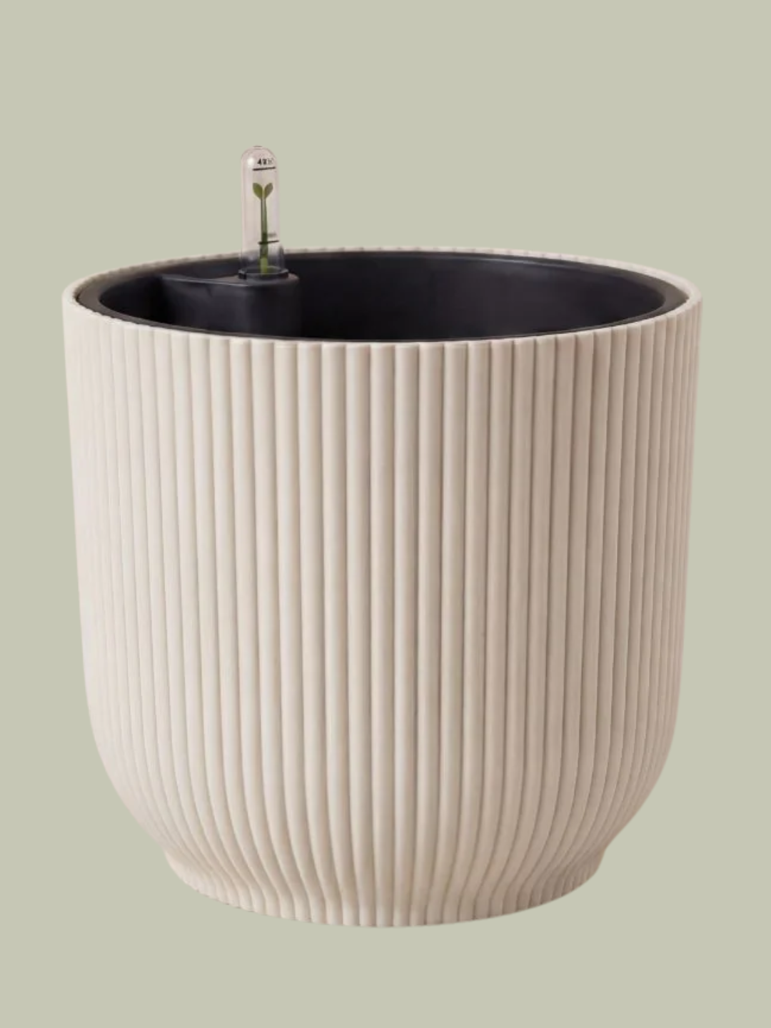 An off-white planter with a self-watering insert from Beards &amp;amp; Daisies