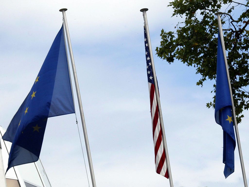 EU and U.S. flags.