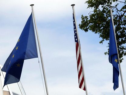 EU and U.S. flags.