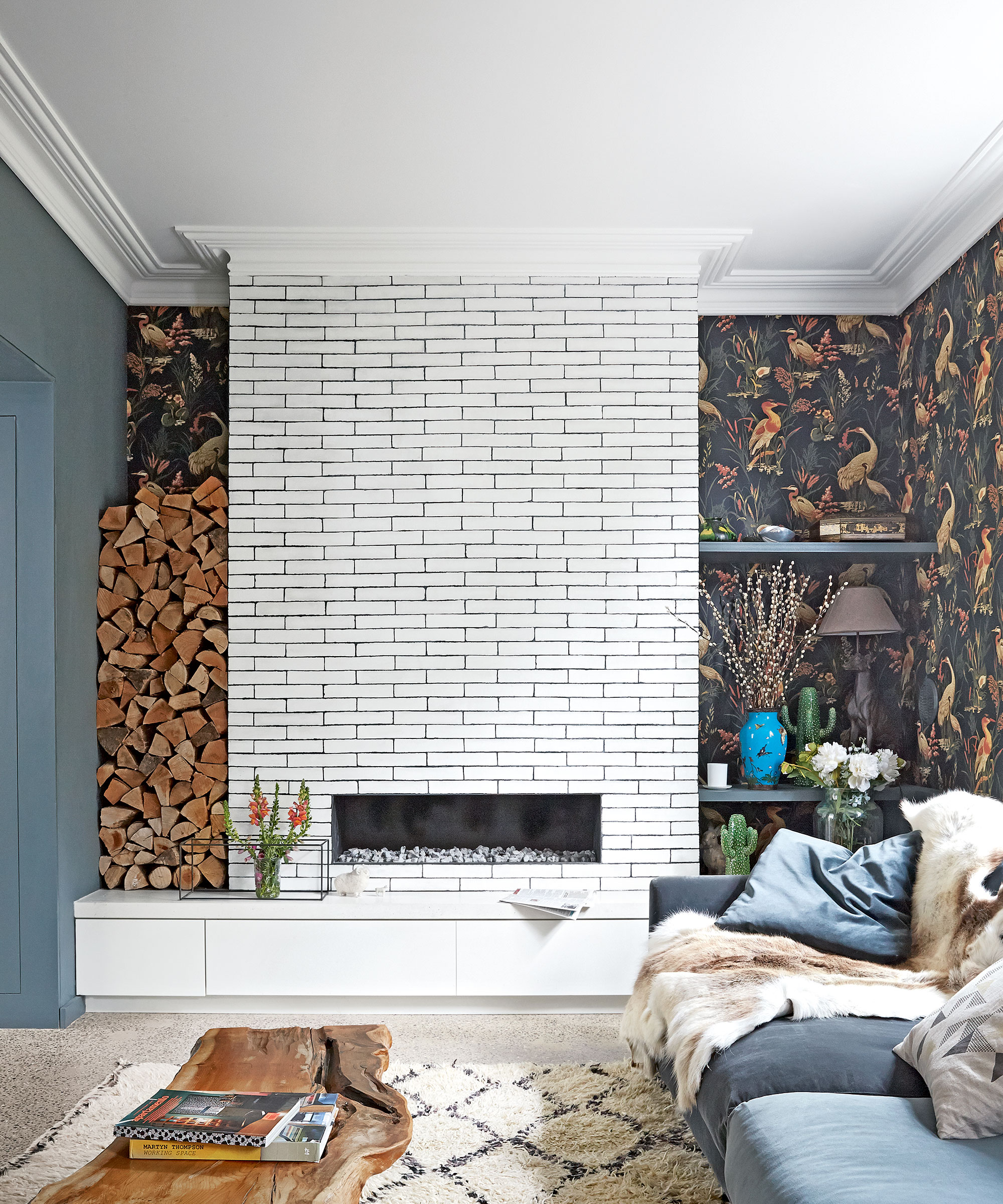 Living room corner with log pile