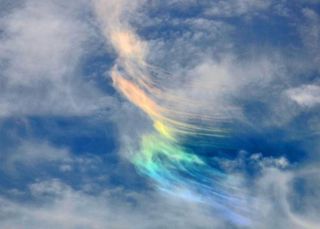 rainbow clouds forming a circumhorizon arc