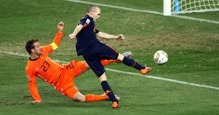Andres Iniesta of Spain scores during the 2010 FIFA World Cup South Africa Final match between Netherlands and Spain at Soccer City Stadium on July 11, 2010 in Johannesburg, South Africa.