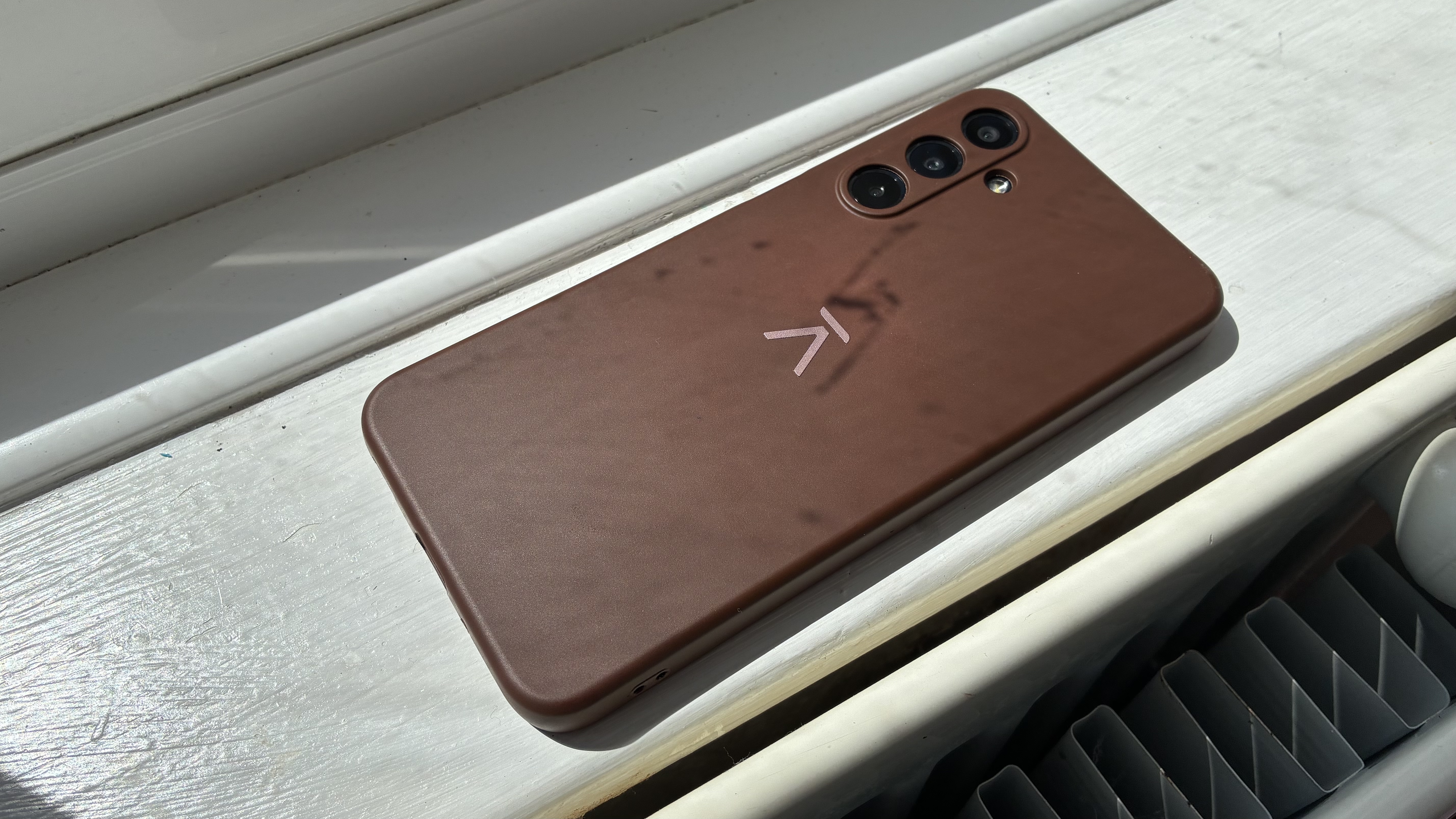The Balance Phone by a window