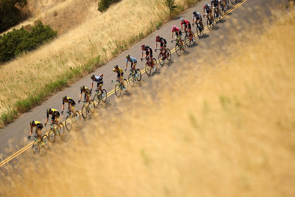 The peloton was lined out on the climb