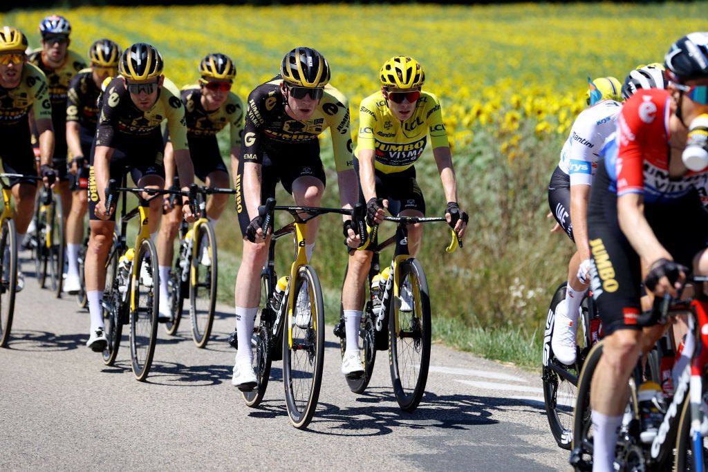 GRAND COLOMBIER FRANCE JULY 14 LR Tiesj Benoot of Belgium Jonas Vingegaard of Denmark Yellow Leader Jersey and Nathan Van Hooydonck of Belgium and Team JumboVisma compete during the stage thirteen of the 110th Tour de France 2023 a 1378km stage from ChtillonSurChalaronne to Grand Colombier 1501m UCIWT on July 14 2023 in Grand Colombier France Photo by Michael SteeleGetty Images