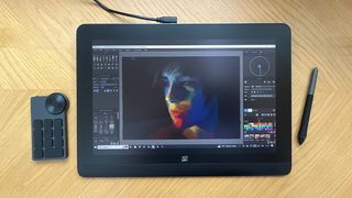 XPPen Artist Pro 16 (Gen 2) review; a tablet on a wooden table