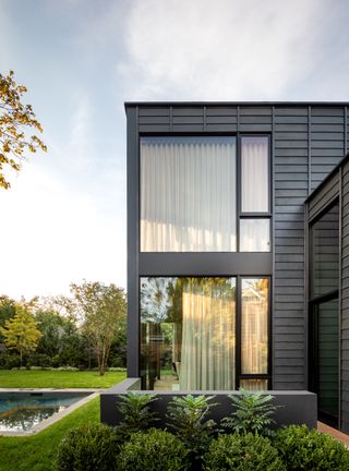 minimalst sag harbour house with large glazed windows and clean aesthetic inside and out