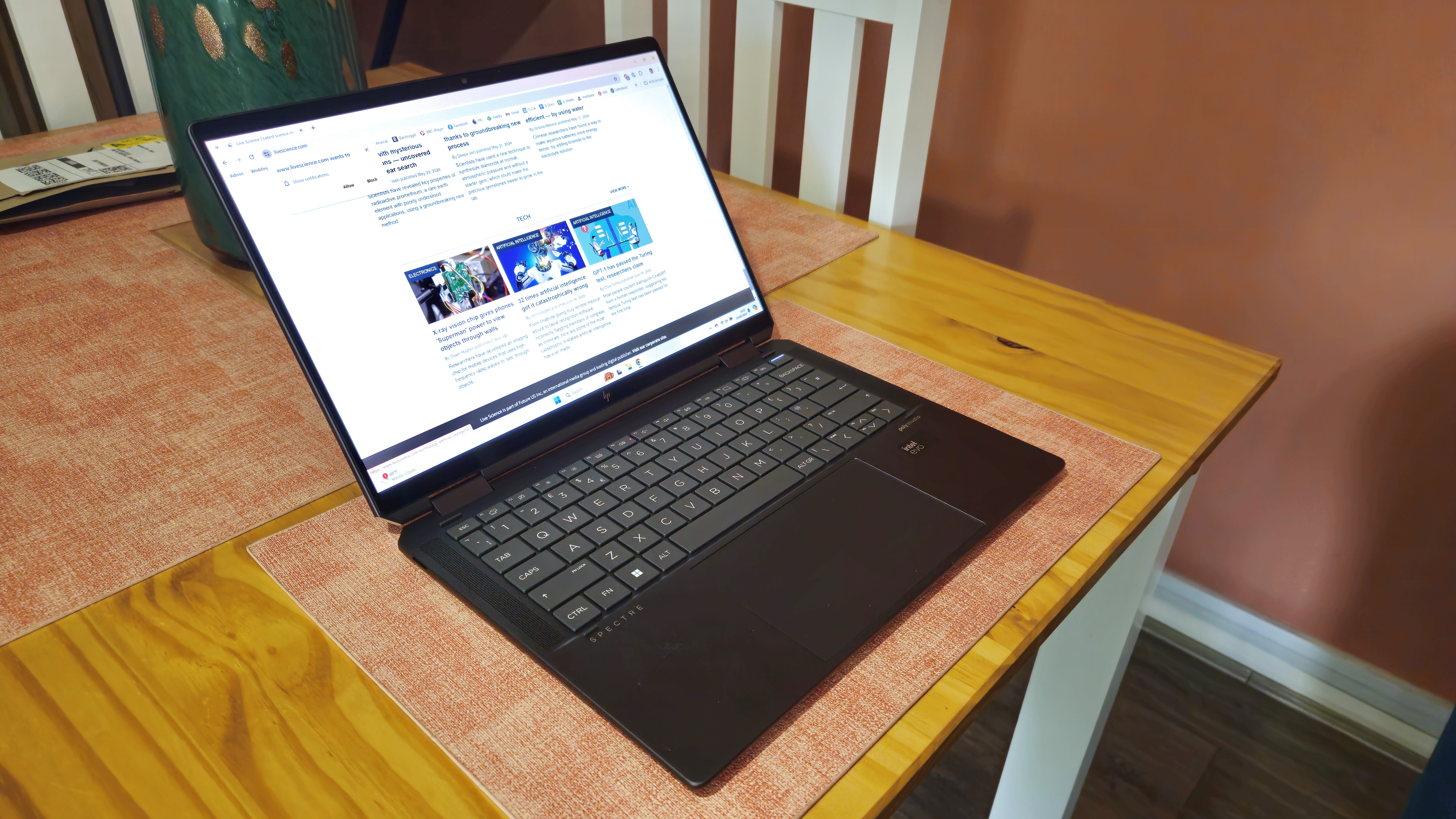 HP Spectre x360 14 (2024) in laptop configuration on a table