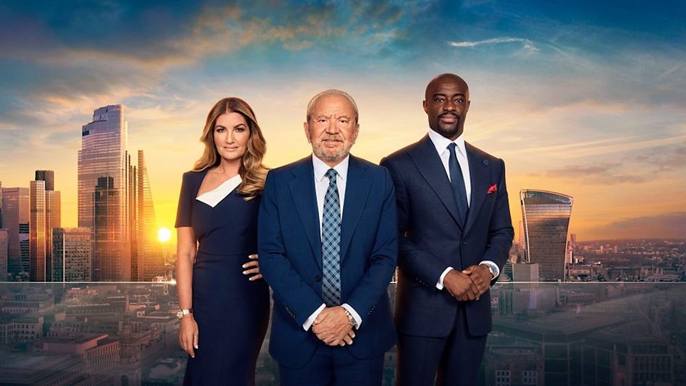 Baroness Karren Brady, Lord Alan Sugar and Tim Campbell MBE pose to the camera in front of the London skyline in a promotional image for &#039;The Apprentice&#039; season 19