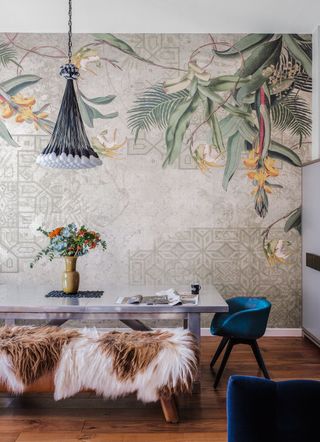 a wall mural in a dining room