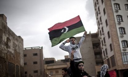 Anti-government protesters in East Libya: NATO military forces are considering a no-fly zone over Libya to prevent Moammar Gadhafi from bombing rebels and civilians.