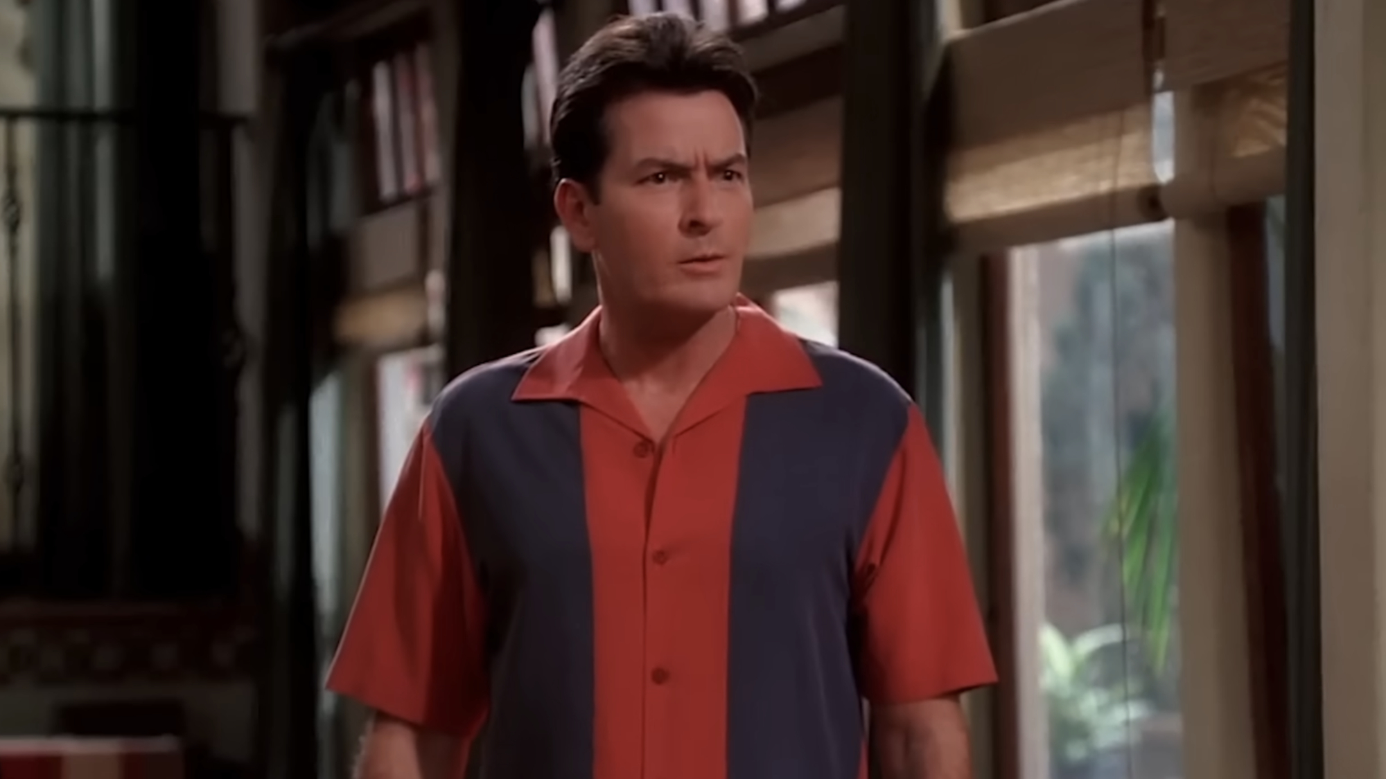 Charlie Harper (Charlie Sheen) speaks to Alan, Jake and Berta about his late friend on Two and a Half Men.