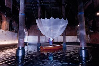 A shot of the ’Yohji Making Waves’ installation set-up in progress at The Wapping Project.