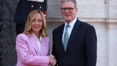 Keir Starmer and Giorgia Meloni shaking hands in Rome