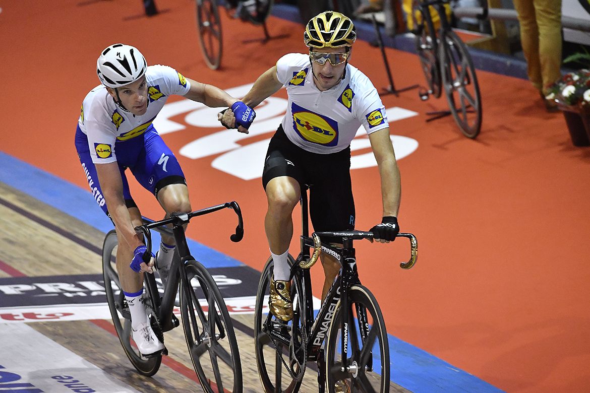 Iljo Keisse gets thrown in by Elia Viviani