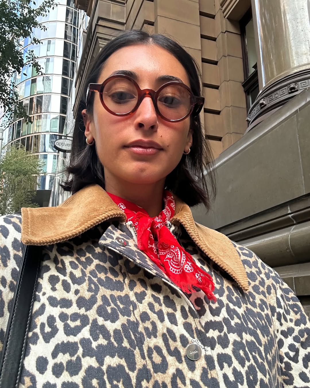 woman with short hair and sunglasses