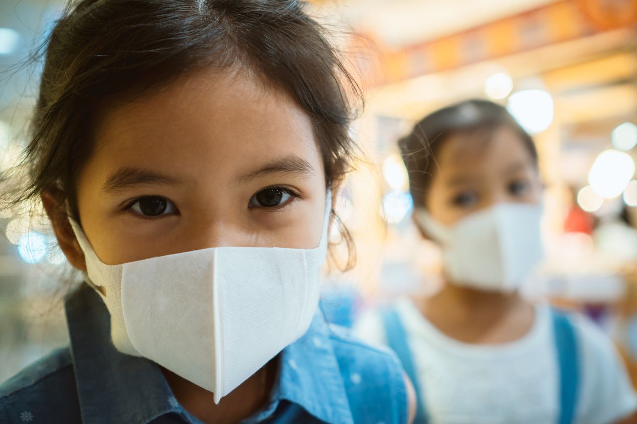 Kids wearing masks.