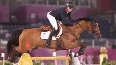 Harry Charles and Romeo, pictured here at the Tokyo Olympics, jumped double clear in the Aachen CHIO Nations Cup