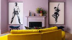 lavender living room with bright yellow sofa and large artwork