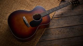 Martin GPE Inception Maple photographed against a wheat coloured woven rug.
