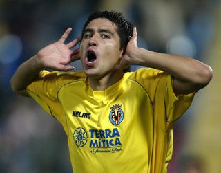 Juan Roman Riquelme celebrates a goal for Villarreal against Torpedo Moscow in 2003.