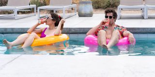 Palm Springs Sarah and Nyles drinking in the pool
