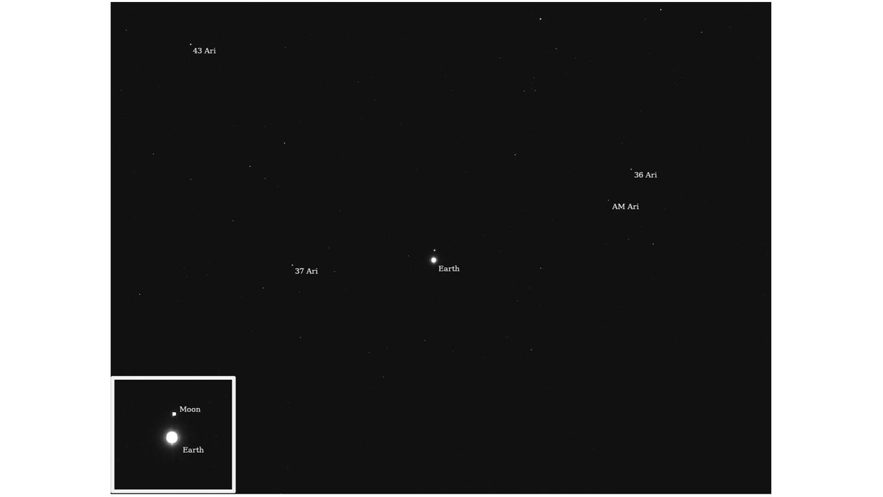 NASA's Psyche asteroid probe beams home haunting view of distant Earth (photo)