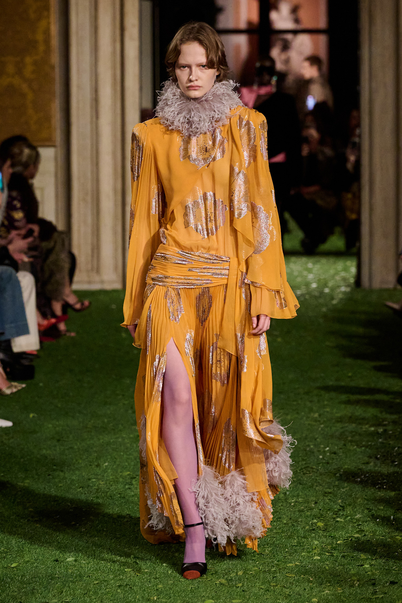 Photos of runway models at Valentino Fall Winter 2026 show.