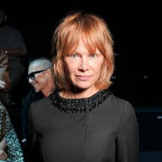 a white woman with short red hair