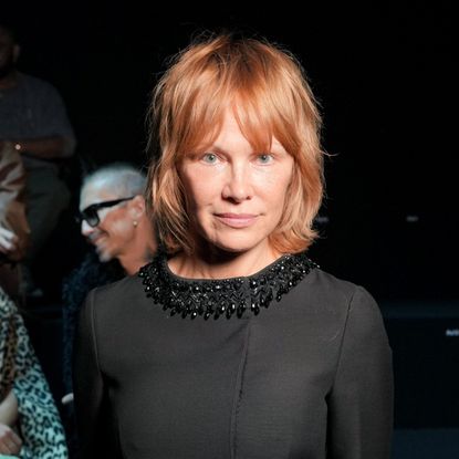 a white woman with short red hair